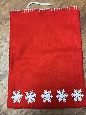 Red Felt Christmas Gift Bag with White Snowflake Accents & Drawstring Closure